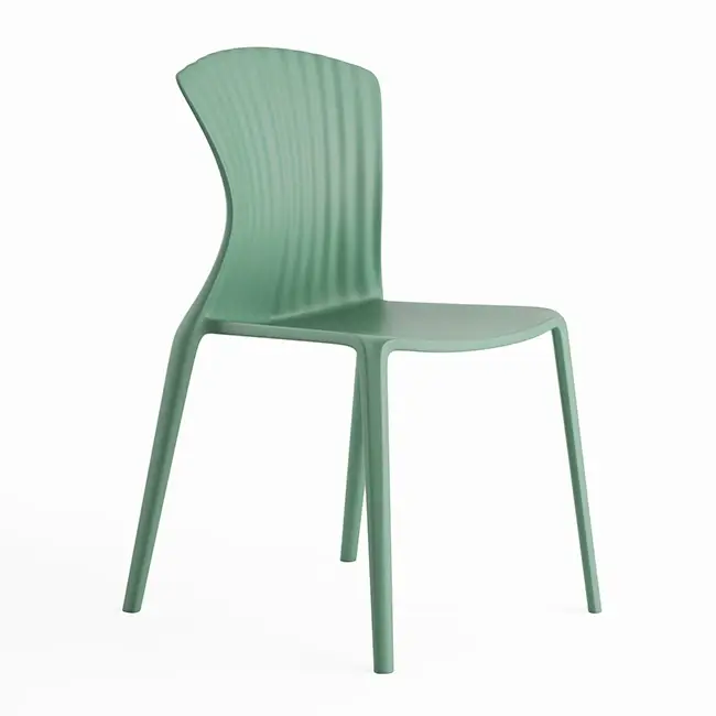 Mint green plastic dining chair on white background