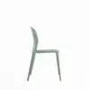 Side view of a sage green plastic chair