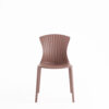 Dusty pink plastic chair with ribbed backrest