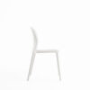 Side view of a white plastic dining chair