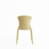 Gold ribbed plastic chair viewed from the back